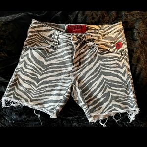 TRIPP NYC cut off zebra print jean shorts